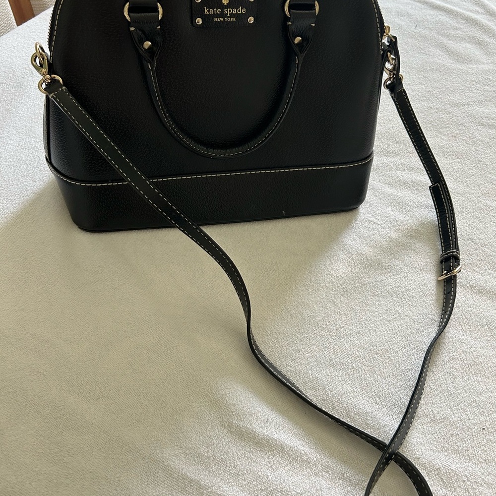 Gently used. Width 12.5”Height 10 “Depth 5”Adjustable strap and handles.